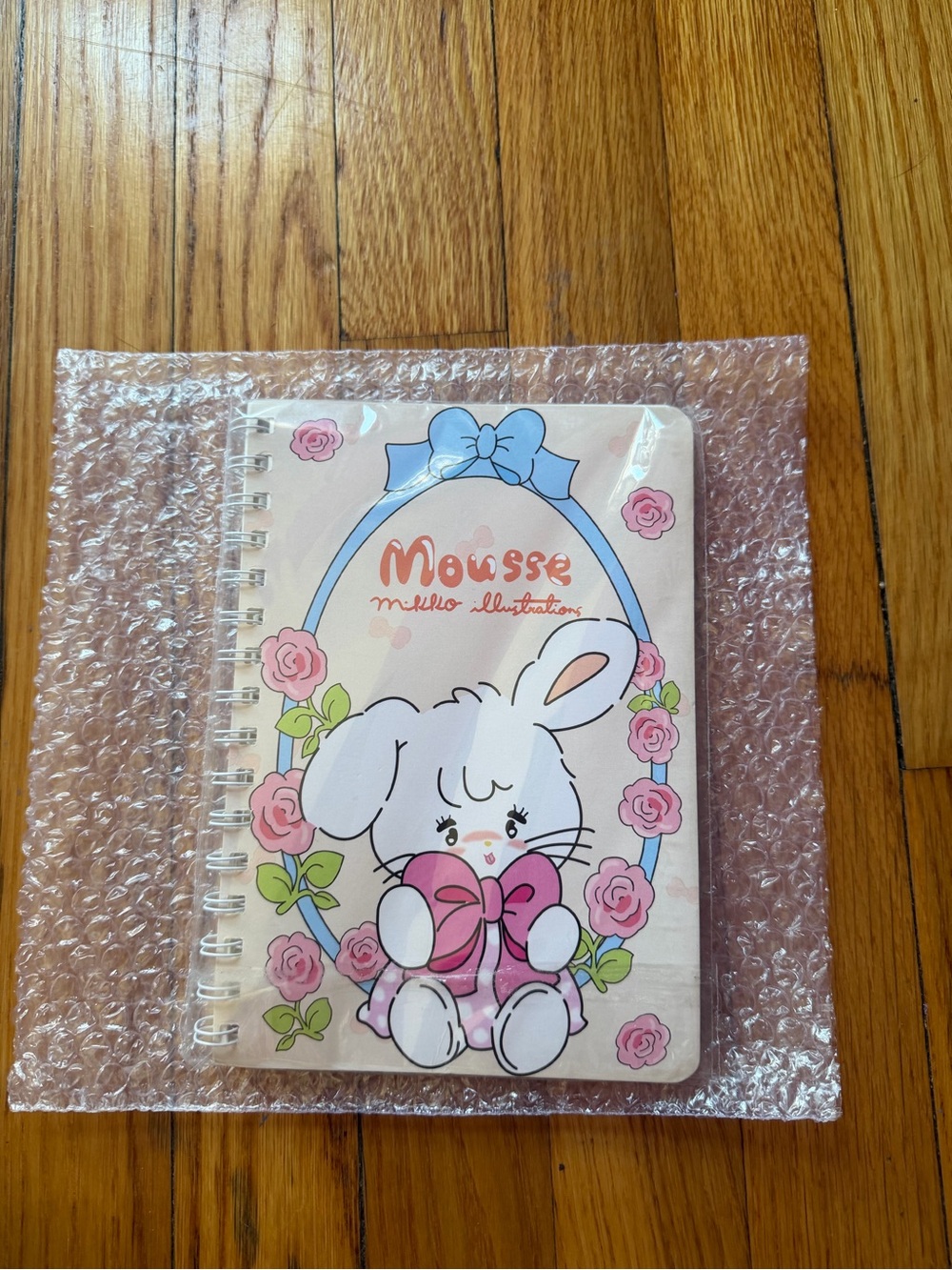 & Other Stories Pink Bunny Spiral Notebook with Blue Bow